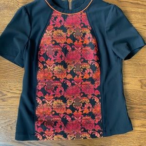Red and orange floral pattern T-shirt
